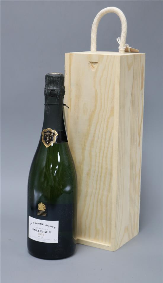 A bottle of Bollinger Grande Annee 2005 in wooden presentation case